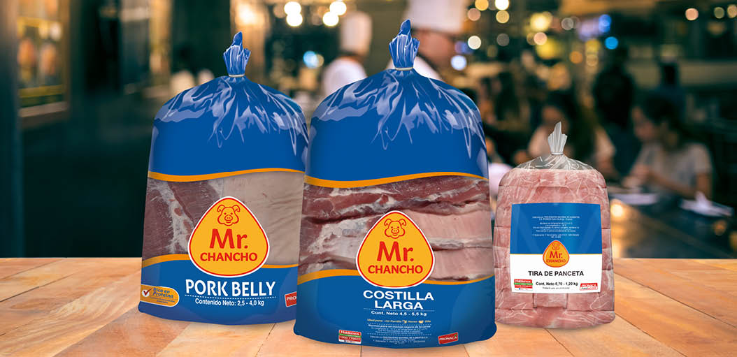 Wood table top with blur chef cooking in bar restaurant background.For create product display or design key visual layout