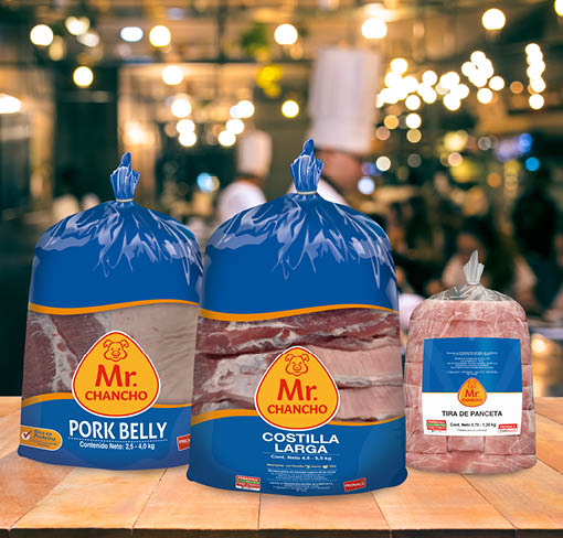 Wood table top with blur chef cooking in bar restaurant background.For create product display or design key visual layout